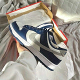 Nike Dunk Low Midnight Navy - HADNUS